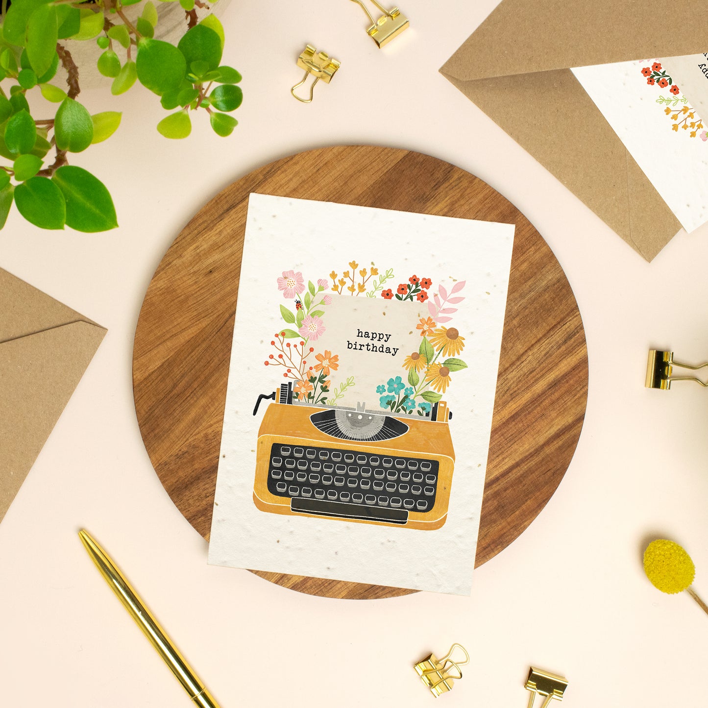 Plantable typewriter birthday card on wooden board