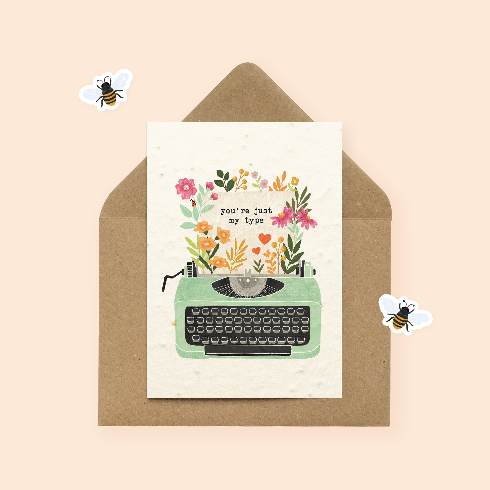 Plantable typewriter valentine's day card with wildflowers and kraft envelope
